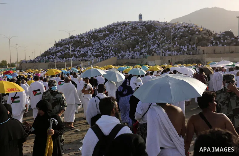 Muslim pilgrims pray on Mount Arafat, as Jabal al-Rahma near Mecca, as they take part in one of the Hajj rituals southeast of the Saudi holy city of Mecca on August 10, 2019. Arafat is the site where Muslims believe the...