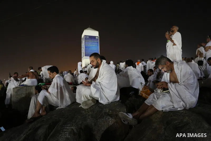 Muslim pilgrims pray on Mount Arafat, as Jabal al-Rahma near Mecca, as they take part in one of the Hajj rituals southeast of the Saudi holy city of Mecca on August 10, 2019. Arafat is the site where Muslims believe the...