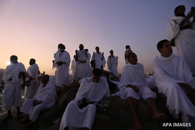 Muslim pilgrims pray on Mount Arafat, as Jabal al-Rahma near Mecca, as they take part in one of the Hajj rituals southeast of the Saudi holy city of Mecca on August 10, 2019. Arafat is the site where Muslims believe the...