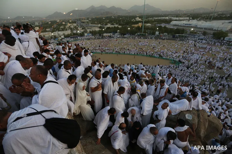 Muslim pilgrims pray on Mount Arafat, as Jabal al-Rahma near Mecca, as they take part in one of the Hajj rituals southeast of the Saudi holy city of Mecca on August 10, 2019. Arafat is the site where Muslims believe the...