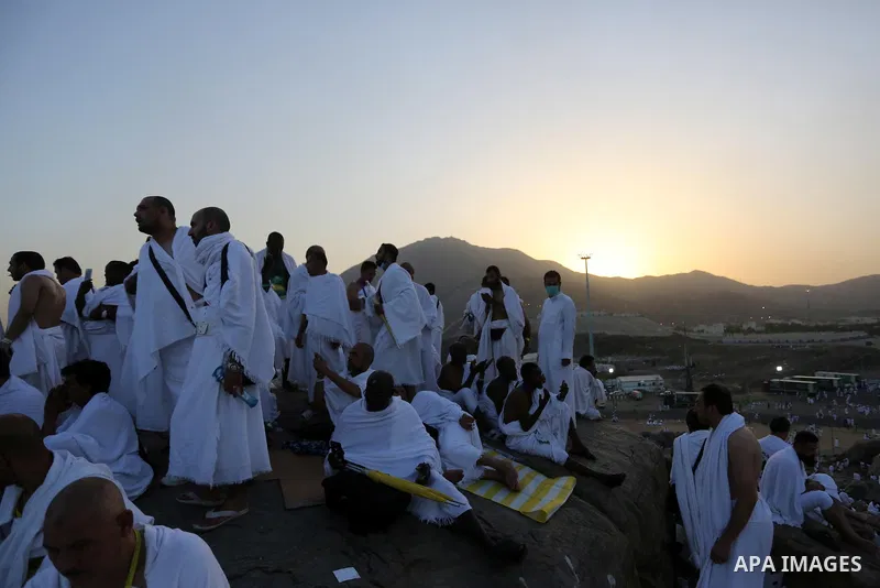 Muslim pilgrims pray on Mount Arafat, as Jabal al-Rahma near Mecca, as they take part in one of the Hajj rituals southeast of the Saudi holy city of Mecca on August 10, 2019. Arafat is the site where Muslims believe the...