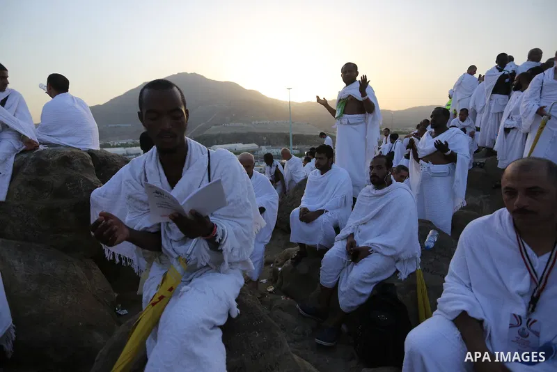 Muslim pilgrims pray on Mount Arafat, as Jabal al-Rahma near Mecca, as they take part in one of the Hajj rituals southeast of the Saudi holy city of Mecca on August 10, 2019. Arafat is the site where Muslims believe the...