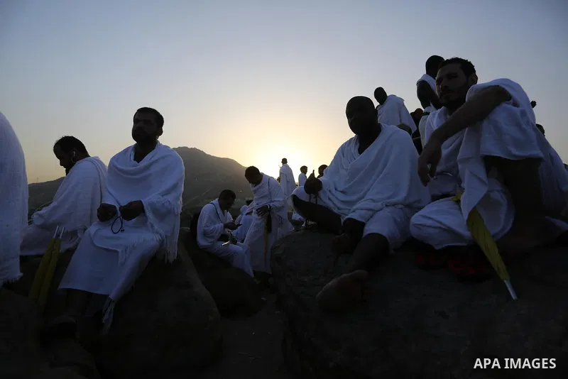 Muslim pilgrims pray on Mount Arafat, as Jabal al-Rahma near Mecca, as they take part in one of the Hajj rituals southeast of the Saudi holy city of Mecca on August 10, 2019. Arafat is the site where Muslims believe the...