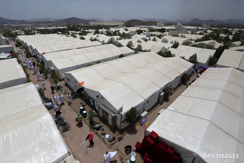 Palestinian piligrims gather in the tent city of Mina as they take part in one of the Hajj rituals southeast of the Saudi holy city of Mecca on August 10, 2019. More than 2 million pilgrims gathered in the tent city of M...