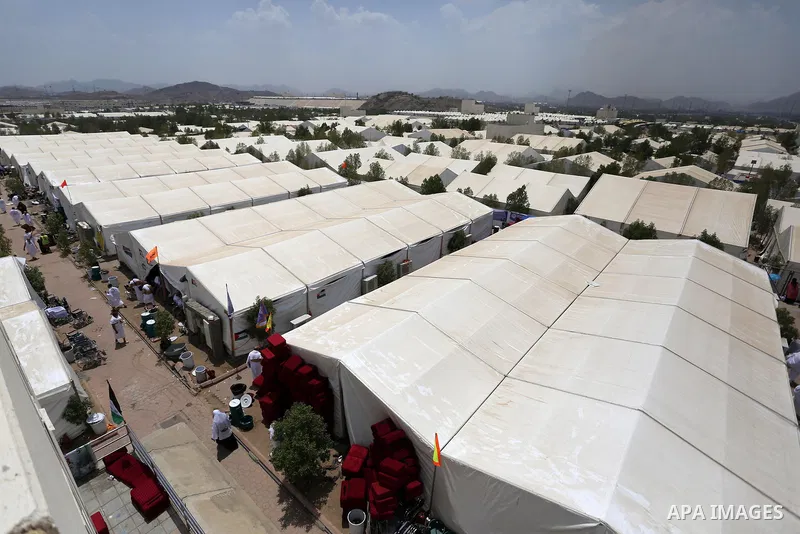 Palestinian piligrims gather in the tent city of Mina as they take part in one of the Hajj rituals southeast of the Saudi holy city of Mecca on August 10, 2019. More than 2 million pilgrims gathered in the tent city of M...