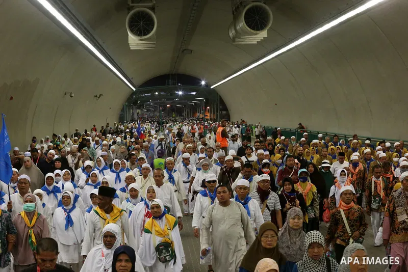 Muslim pilgrims arrive to throw pebbles at pillars during the "Jamarat" ritual, the stoning of Satan, in Mina near the holy city of Mecca, on August 13, 2019. Pilgrims pelt pillars symbolizing the devil with pebbles to s...