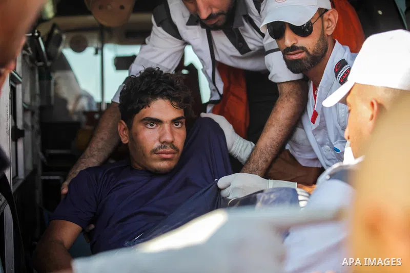A wounded Palestinian protester is evacuated during clashes with Israeli troops following the tents protest where Palestinians demand the right to return to their homeland at the Israel-Gaza border, in Jabalia in the nor...