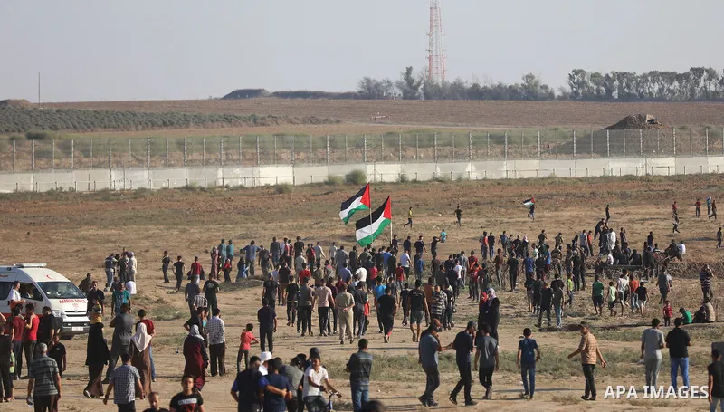 Palestinian gather at the tents protest where Palestinians demand the right to return to their homeland at the Israel-Gaza border, in the east of Gaza city, September 06, 2019. At least two Palestinians were killed and o...