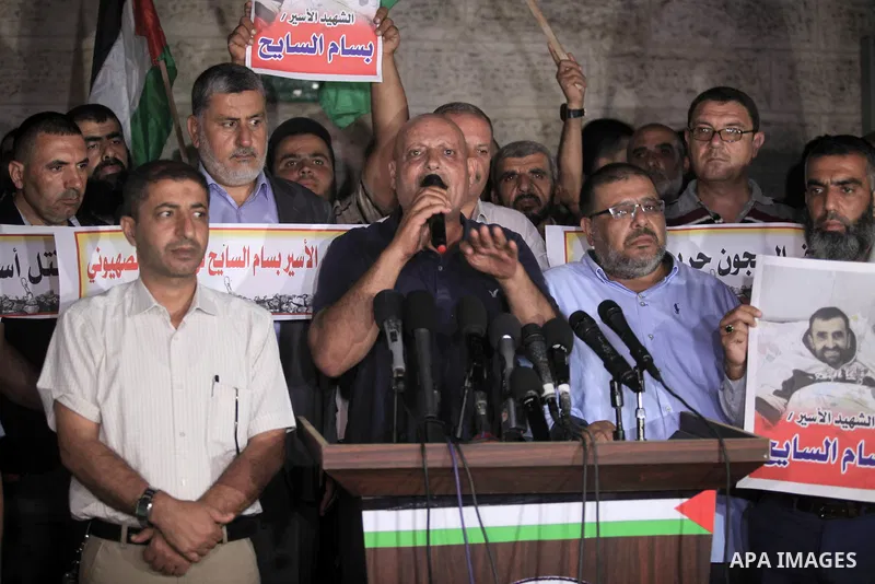 Palestinians take part in a protst against the death of the prisoner Bassam Al-Sayeh in the in the Israeli jails, outside the Red Cross headquarter in Gaza city, September 08, 2019. Al-Sayeh, 47, was detained in 2015 and...