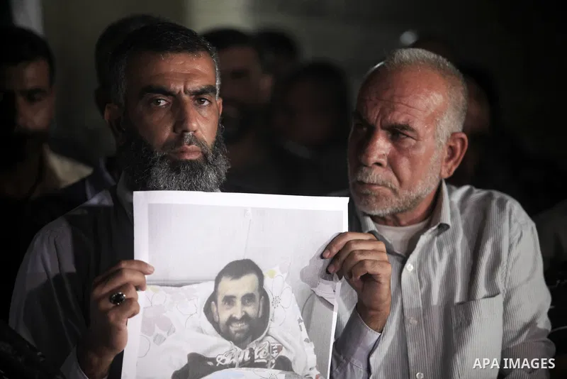 Palestinians take part in a protst against the death of the prisoner Bassam Al-Sayeh in the in the Israeli jails, outside the Red Cross headquarter in Gaza city, September 08, 2019. Al-Sayeh, 47, was detained in 2015 and...