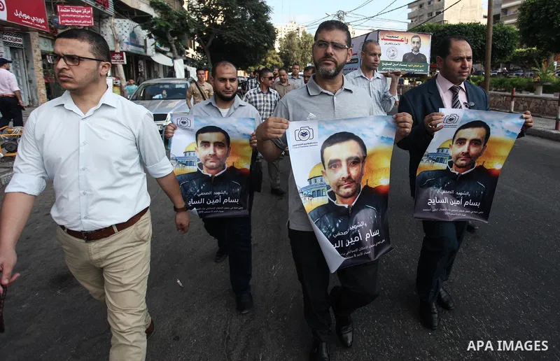 Palestinians take part in a protest against the death of the prisoner Bassam Al-Sayeh in the in the Israeli jails, in Gaza city on September 09, 2019. Al-Sayeh, 47, was detained in 2015 and was diagnosed with bone cancer...