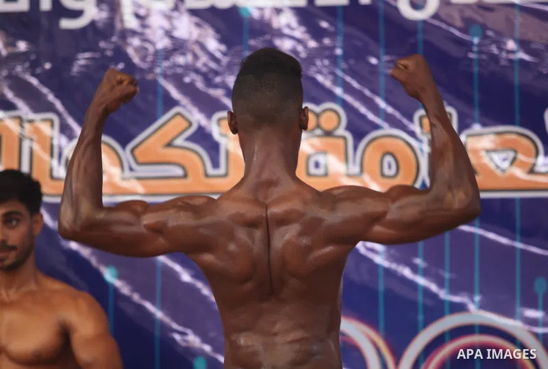 A Palestinian contestant takes part the Palestine Bodybuilding Championship in Gaza City, on september 15, 2019. Photo by Mahmoud Ajjour