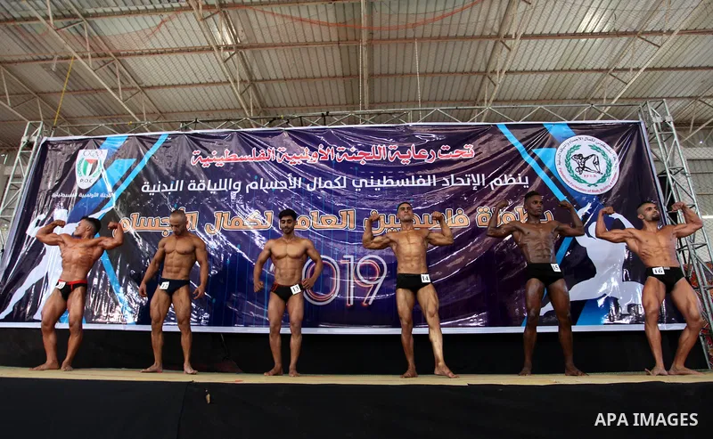 Palestinian contestants take part in the Palestine Bodybuilding Championship in Gaza city, on september 15, 2019. Photo by Mahmoud Ajjour