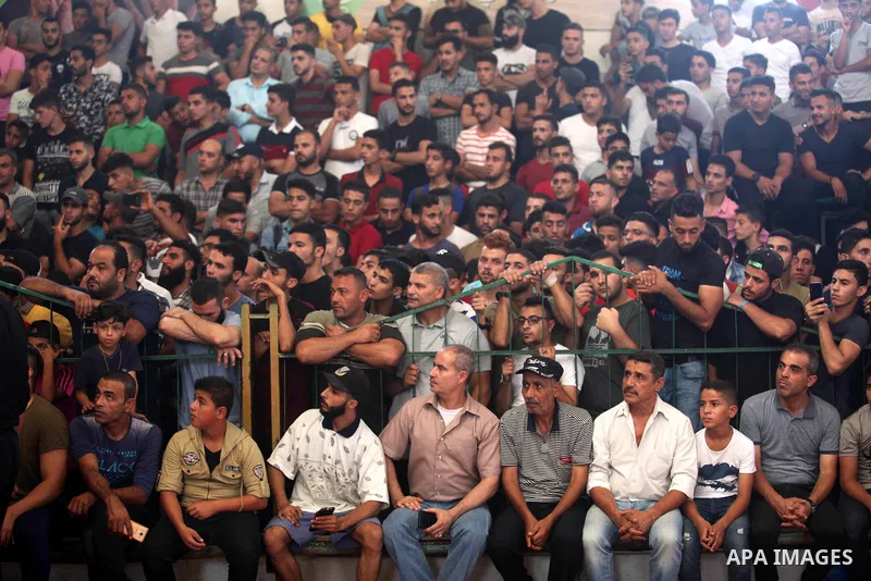 Palestinians attend the Palestine Bodybuilding Championship in Gaza City, on September 15, 2019. Photo by Mahmoud Ajjour