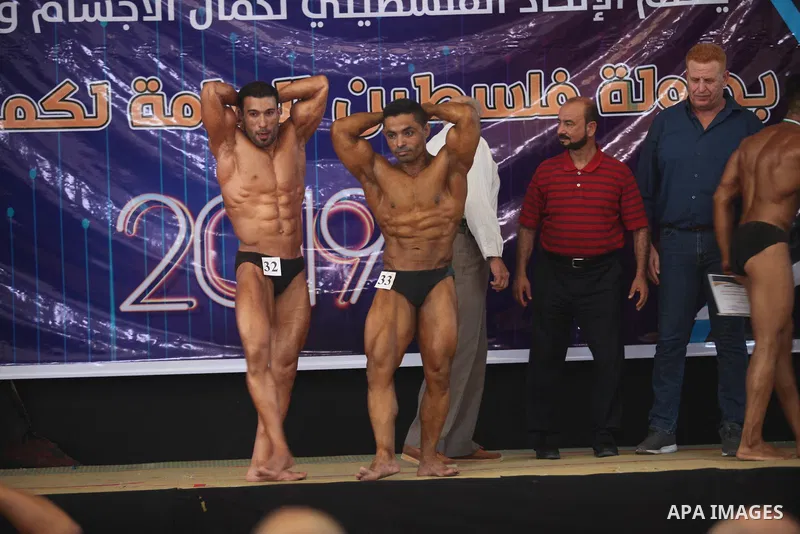 Palestinian contestants take part in the Palestine Bodybuilding Championship in Gaza city, on september 15, 2019. Photo by Mahmoud Ajjour