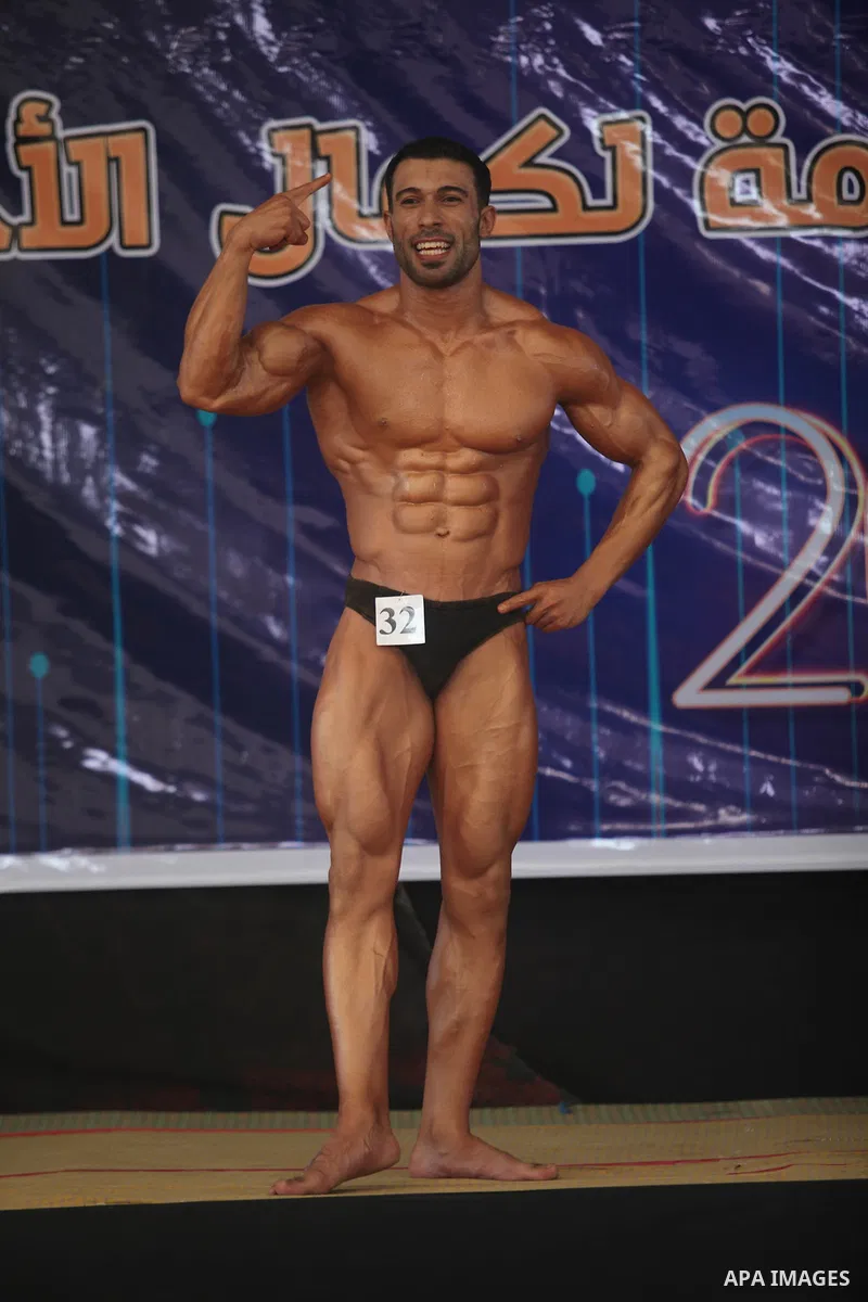 A Palestinian contestant takes part the Palestine Bodybuilding Championship in Gaza City, on september 15, 2019. Photo by Mahmoud Ajjour