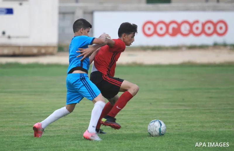 Palestinian players compete in a match of the "Malaysian-Palestinian Football league", Organizer by the Ministry of sport and youth, in Gaza city on September 19, 2019. Photo by Mahmoud Ajjour