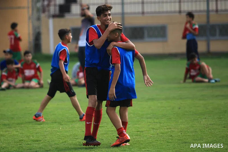 Palestinian players compete in a match of the "Malaysian-Palestinian Football league", Organizer by the Ministry of sport and youth, in Gaza city on September 19, 2019. Photo by Mahmoud Ajjour