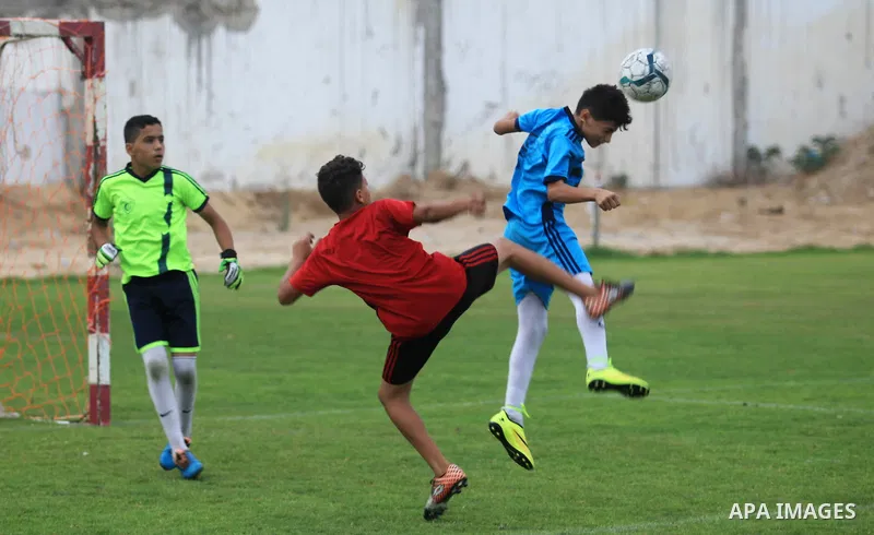 Palestinian players compete in a match of the "Malaysian-Palestinian Football league", Organizer by the Ministry of sport and youth, in Gaza city on September 19, 2019. Photo by Mahmoud Ajjour