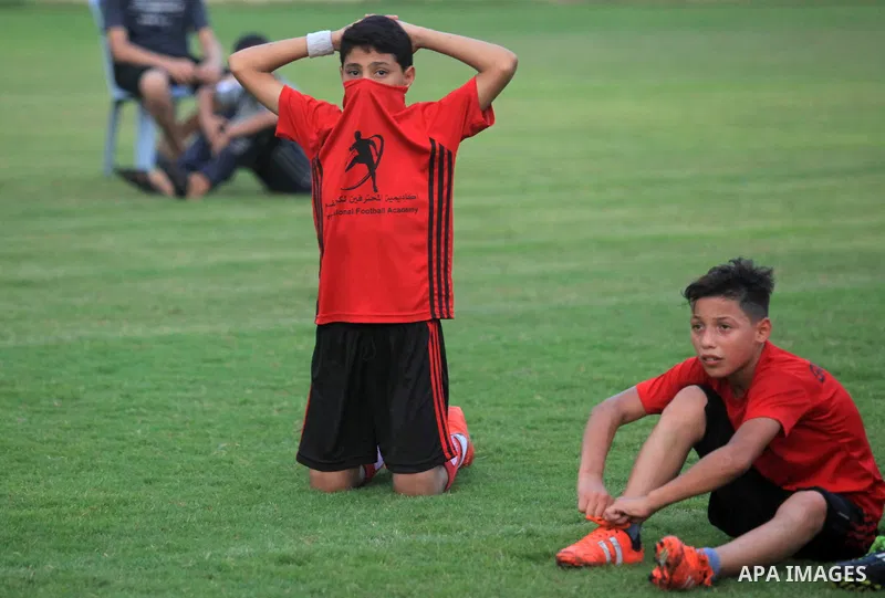 Palestinian players compete in a match of the "Malaysian-Palestinian Football league", Organizer by the Ministry of sport and youth, in Gaza city on September 19, 2019. Photo by Mahmoud Ajjour