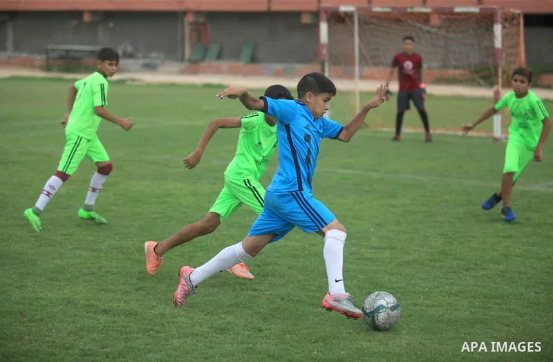 Palestinian players compete in a match of the "Malaysian-Palestinian Football league", Organizer by the Ministry of sport and youth, in Gaza city on September 19, 2019. Photo by Mahmoud Ajjour