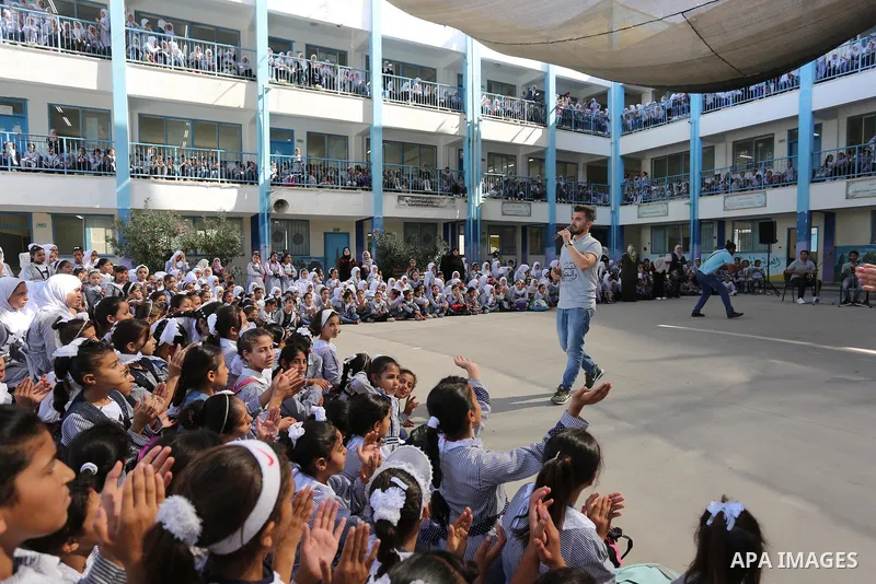 Palestinian students attend the Sea and Freedom Festival, at their school run by the United Nations Relief and Works Agency (UNRWA), in Beit Hanoun in the northern Gaza Strip, on September 26, 2019. Photo by Ashraf Amra