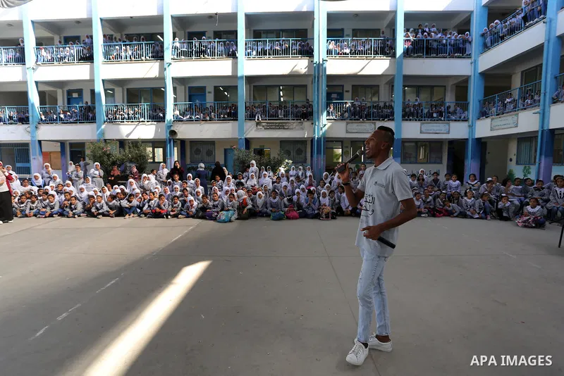 Palestinian students attend the Sea and Freedom Festival, at their school run by the United Nations Relief and Works Agency (UNRWA), in Beit Hanoun in the northern Gaza Strip, on September 26, 2019. Photo by Ashraf Amra