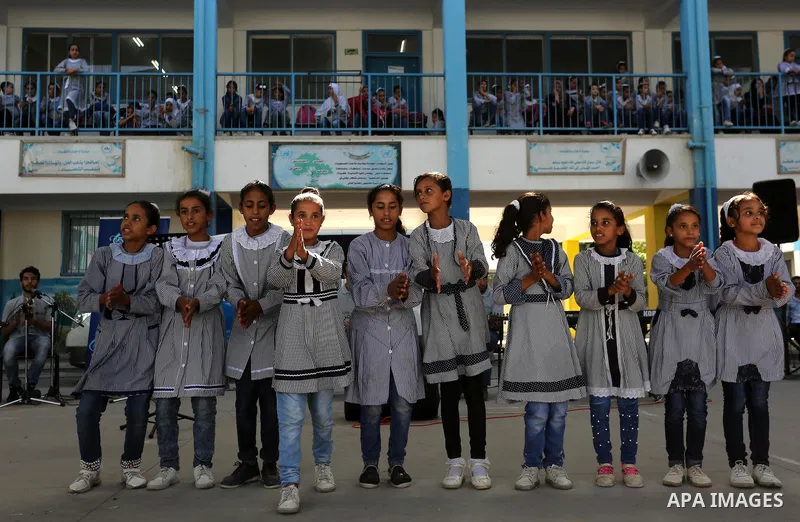 Palestinian students attend the Sea and Freedom Festival, at their school run by the United Nations Relief and Works Agency (UNRWA), in Beit Hanoun in the northern Gaza Strip, on September 26, 2019. Photo by Ashraf Amra