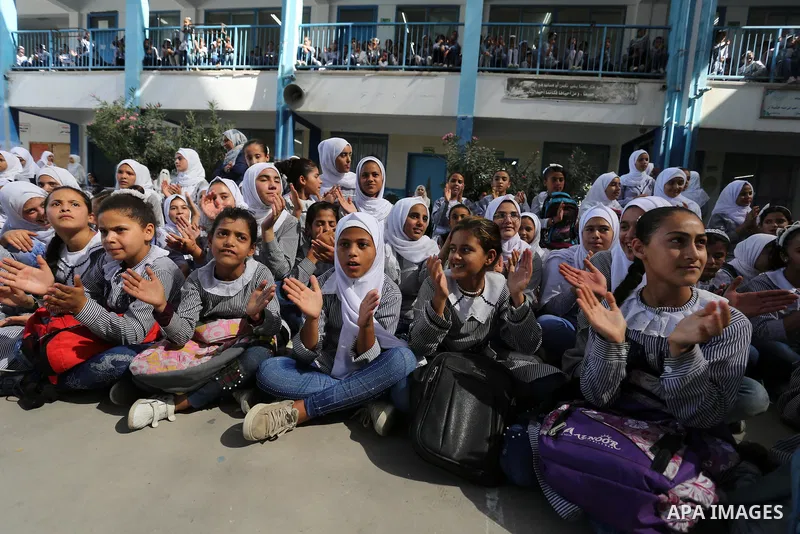 Palestinian students attend the Sea and Freedom Festival, at their school run by the United Nations Relief and Works Agency (UNRWA), in Beit Hanoun in the northern Gaza Strip, on September 26, 2019. Photo by Ashraf Amra