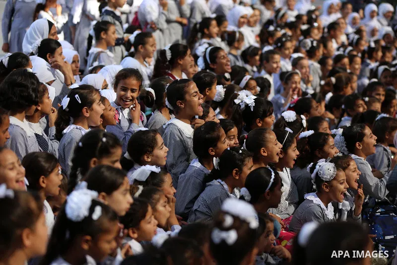 Palestinian students attend the Sea and Freedom Festival, at their school run by the United Nations Relief and Works Agency (UNRWA), in Beit Hanoun in the northern Gaza Strip, on September 26, 2019. Photo by Ashraf Amra