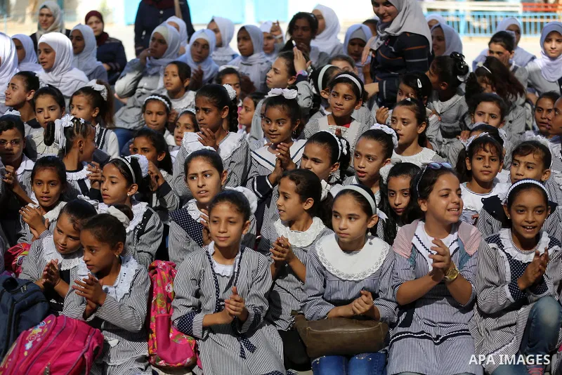 Palestinian students attend the Sea and Freedom Festival, at their school run by the United Nations Relief and Works Agency (UNRWA), in Beit Hanoun in the northern Gaza Strip, on September 26, 2019. Photo by Ashraf Amra