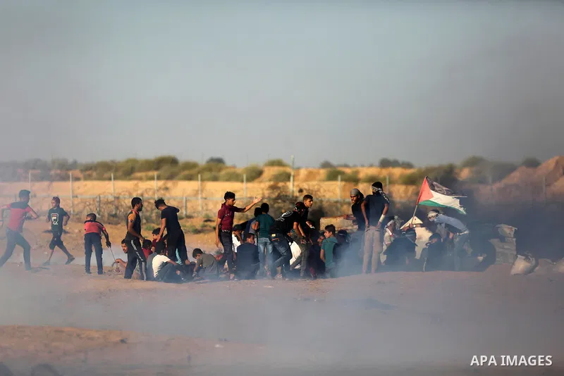 Palestinian protesters clash with Israeli troops following the tents protest where Palestinians demand the right to return to their homeland at the Israel-Gaza border, in Khan Younis in the southern Gaza Strip, Spetember...