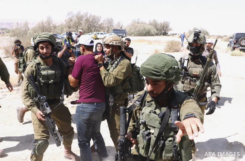 Palestinian demonstrators take part in a protest against Israeli Prime Minister Benjamin Netanyahu, near the Dead Sea in the Israeli-occupied West Bank September 28, 2019. Photo by Sleman abo srour\WAFA