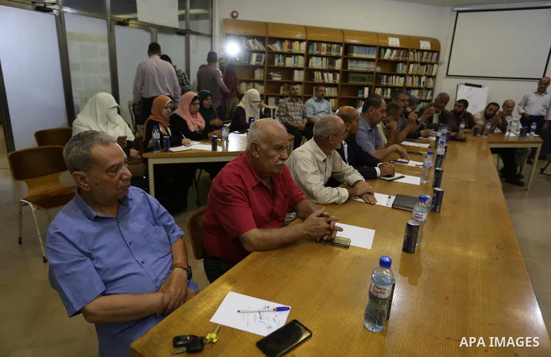 Palestinians attend a seminar marking 19th anniversary of the so-called Al-Aqsa uprising or 'Second Intifada', in Gaza city on September 29, 2019. Photo by Ashraf Amra