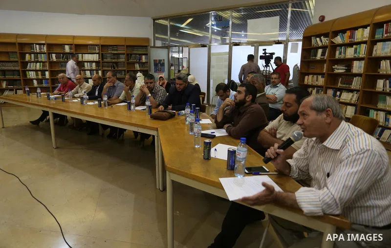 Palestinians attend a seminar marking 19th anniversary of the so-called Al-Aqsa uprising or 'Second Intifada', in Gaza city on September 29, 2019. Photo by Ashraf Amra