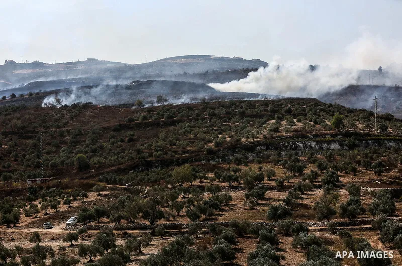Israeli settlers set fire in an olive grove near the West Bank village of Burin, south of Nablus, on October 16, 2019. Photo by Ayman Nubany\WAFA