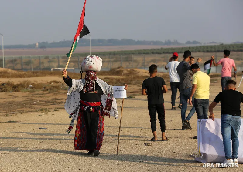 Palestinians take part in a protest to demand the right to return to their homeland at the Israel-Gaza border, in the east of Gaza City on October 16, 2019. Photo by Ashraf Amra