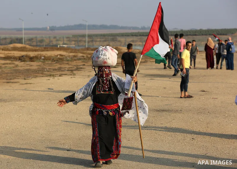 Palestinians take part in a protest to demand the right to return to their homeland at the Israel-Gaza border, in the east of Gaza City on October 16, 2019. Photo by Ashraf Amra