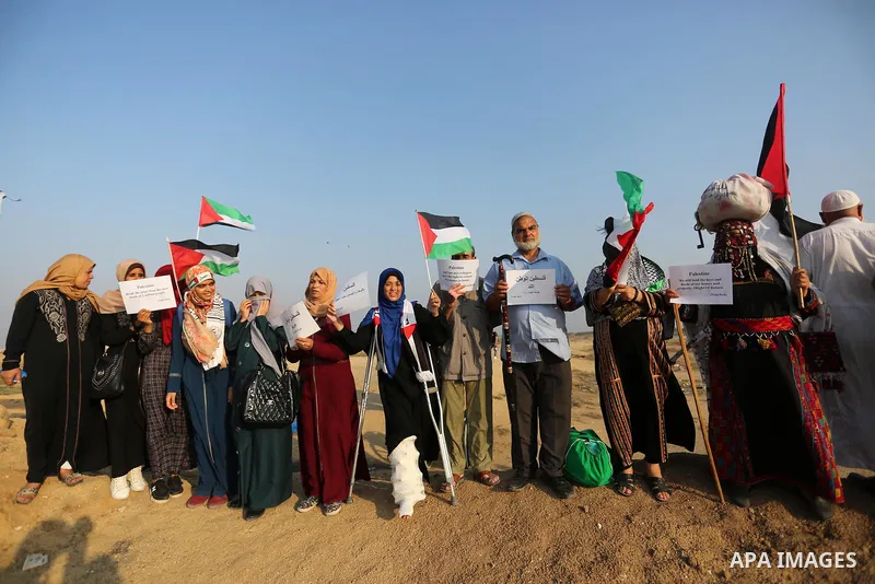 Palestinians take part in a protest to demand the right to return to their homeland at the Israel-Gaza border, in the east of Gaza City on October 16, 2019. Photo by Ashraf Amra