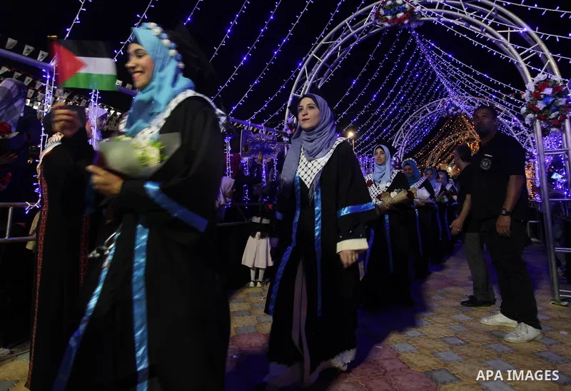 Palestinian students attend their graduation ceremony at al-Azhar University in Gaza city on October 31, 2019. Photo by Mahmoud Ajjour