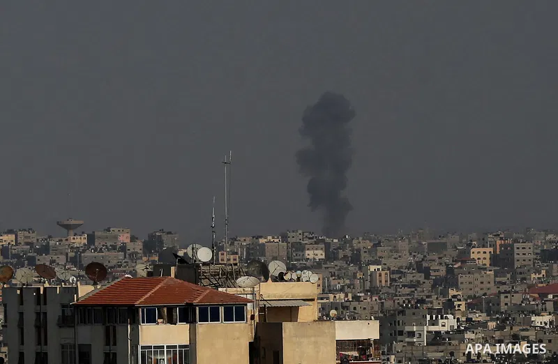 Smoke rises after an Israeli airstrike in Gaza City, on November 12, 2019. Photo by Ashraf Amra
