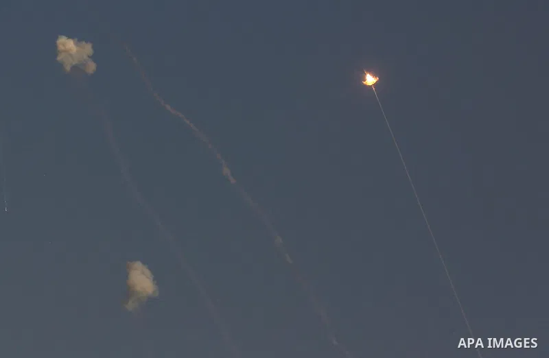 A picture taken from Gaza city shows a missile fired from Israel's Iron Dome air defence system, designed to intercept and destroy incoming short-range rockets and artillery shells, on November 13, 2019. Photo by Ashraf...