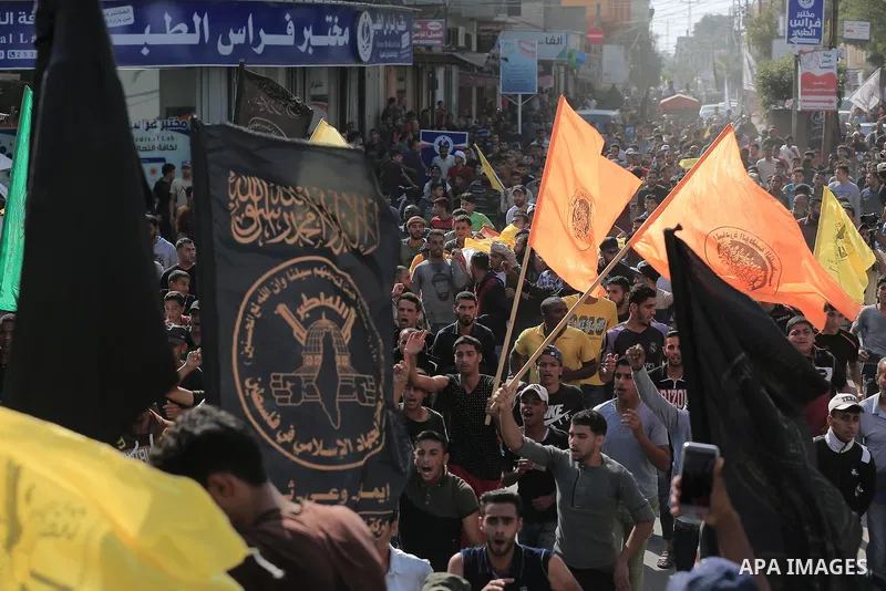 Mourners carry the bodies of Abu Malhous family, who were died hit by an Israeli airstrike during their funeral in Deir al-Balah, central of Gaza Strip on November 14, 2019. Israel and the Palestinian militant group Isla...