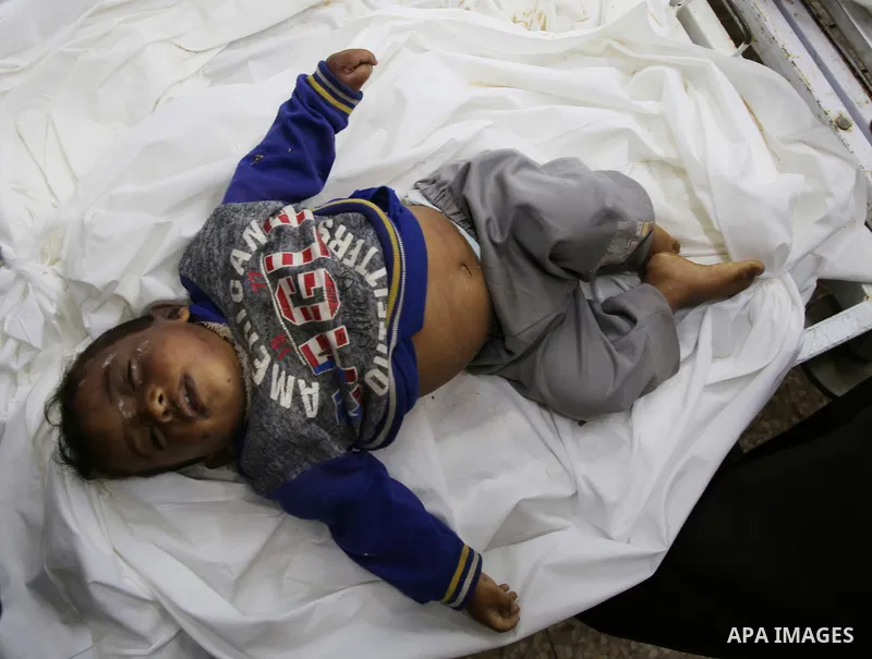 A picture taken on November 14, 2019. The bodies of Palestinians who were died hit by an Israeli airstrike, are seen at a hospital morgue, in Deir al-Balah, central of Gaza Strip. Israel said that it targeted Al Sawarka...