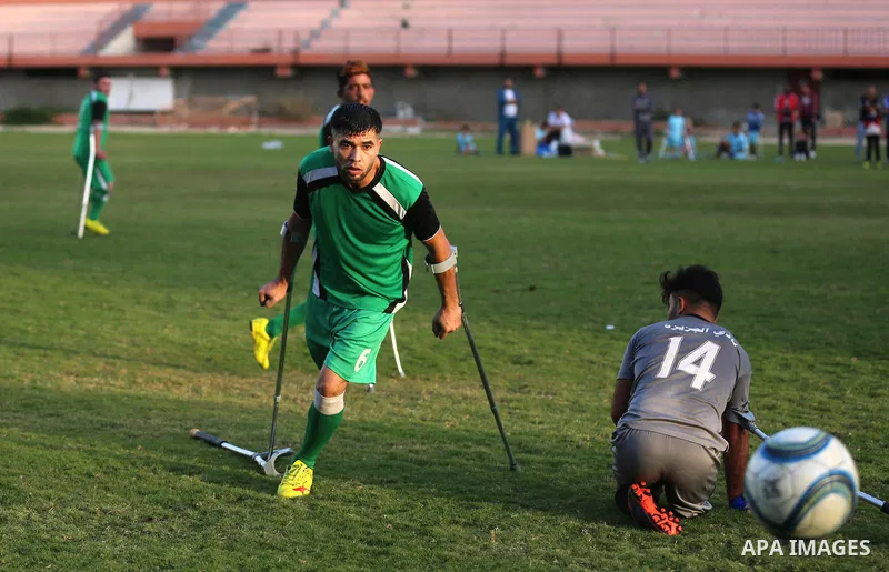 Palestinian amputees players take part in the final match of the amputees football league in Gaza City, on November 26, 2019. Photo by Ashraf Amra