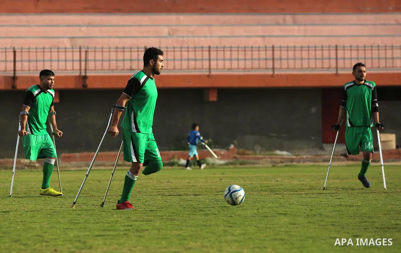 Palestinian amputees players take part in the final match of the amputees football league in Gaza City, on November 26, 2019. Photo by Ashraf Amra