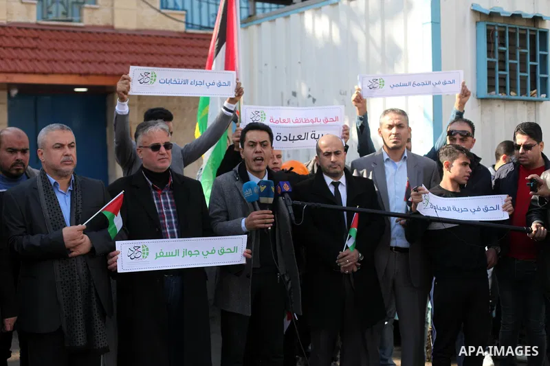 Palestinians take part in a rally demanding their rights on the occasion of the universal declaration of Human Rights in front of the office of the High Commissioner, in Gaza city, on December 10, 2019. Photo by Mahmoud...