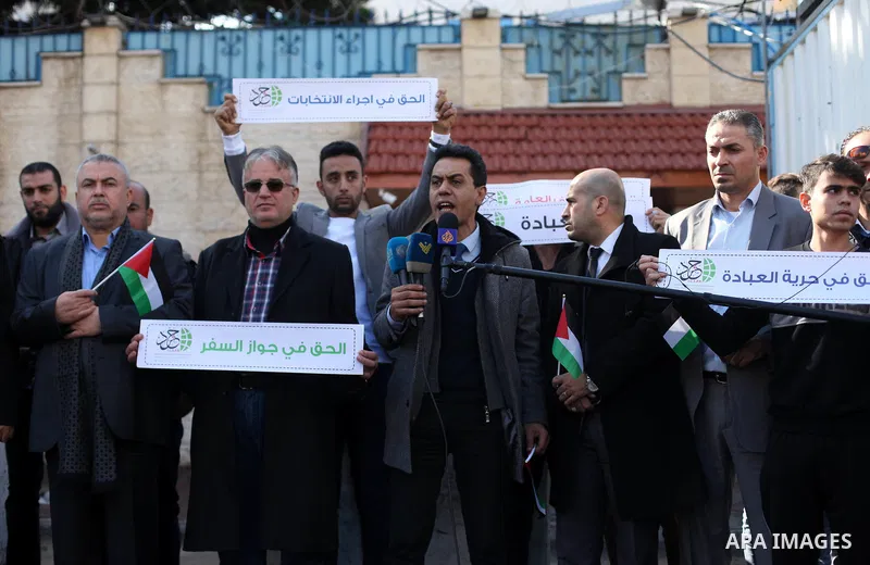 Palestinians take part in a rally demanding their rights on the occasion of the universal declaration of Human Rights in front of the office of the High Commissioner, in Gaza city, on December 10, 2019. Photo by Mahmoud...