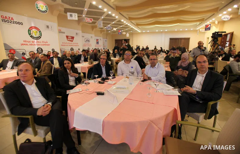 Palestinians attend a ceremony honoring companies holding ISO22000 certificates, in Gaza city on December 11, 2019. Photo by Mahmoud Ajjour