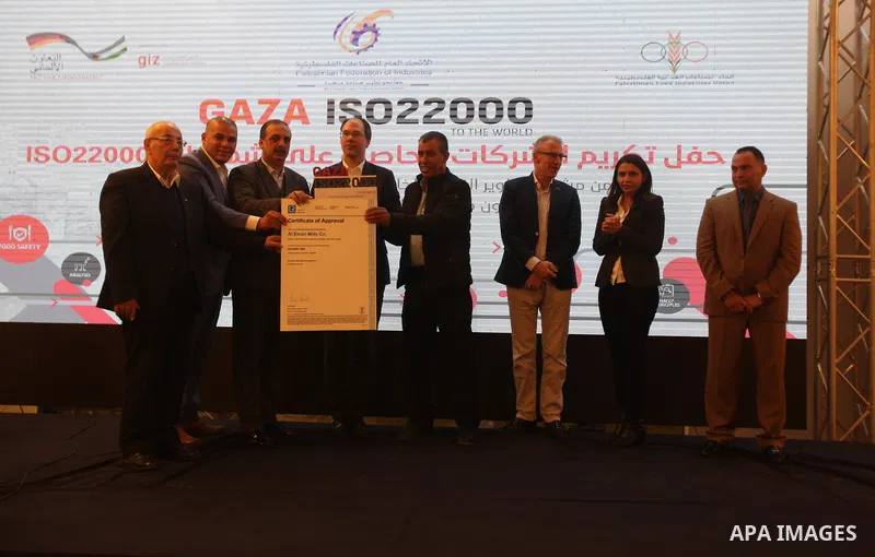 Palestinians attend a ceremony honoring companies holding ISO22000 certificates, in Gaza city on December 11, 2019. Photo by Mahmoud Ajjour